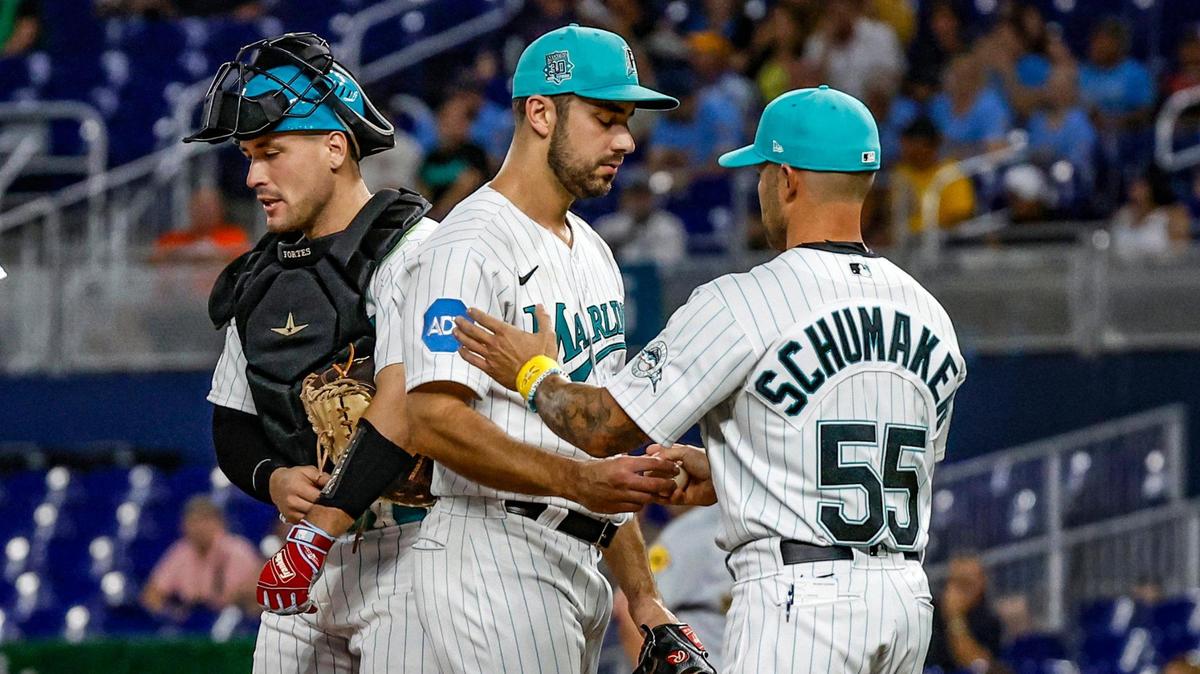Miami Marlins starting pitcher JT Chargois (84) is out of the game by manager Skip Schumaker (55) in the first inning against the Milwaukee Brewers at loanDepot park in Miami on Friday, September 22, 2023.
