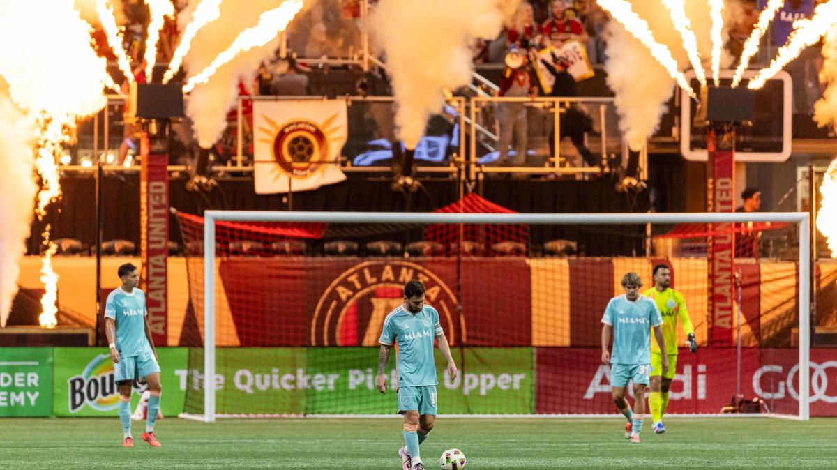 Inter Miami forward Lionel Messi (10) makes his way to half field after Atlanta United defender Derrick Williams (3) scored a goal in the second half of match two of their MLS Playoffs series at the Mercedes-Benz Stadium on Saturday, Nov. 2, 2024, in Atlanta, Ga.