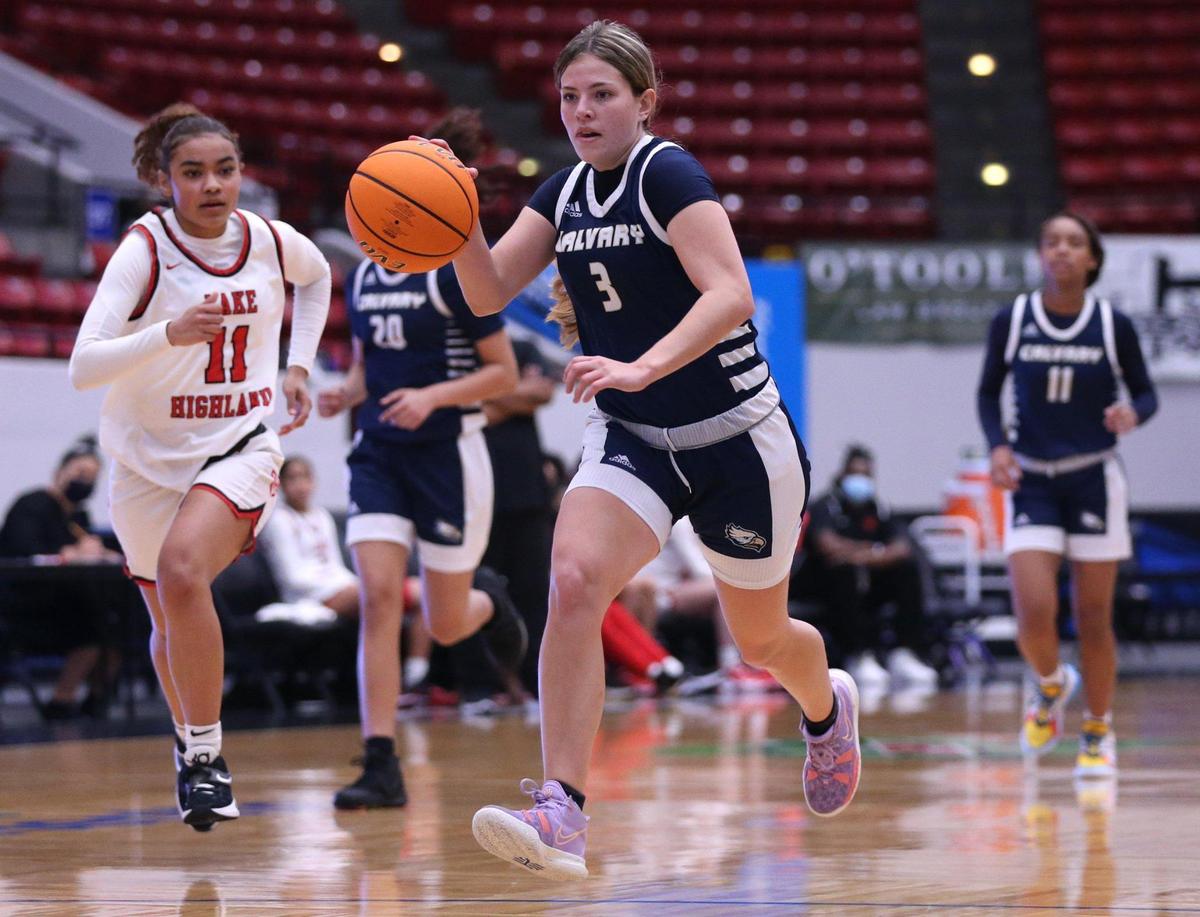 Calvary Christian Academy’s Elizabeth Schnell (3) drives the ball during the game against Lake Highland Prep the Class 4A girls basketball state championship at the RP Funding Center in Lakeland on Saturday, February 26, 2022.