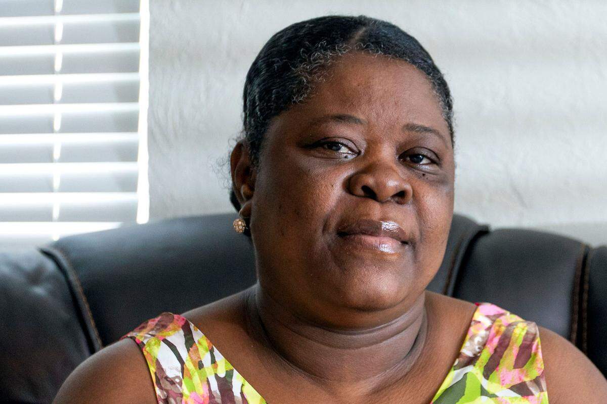 at her home in North Miami on Dec. 17, 2021. The Deus family was denied citizenship after a four year application process by U.S. Citizenship and Immigration Services after they abruptly notified the family that they neglected to submit medical records after months of inquiring when they should send the documents.