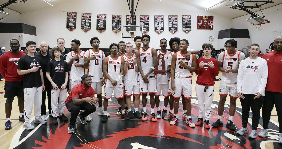 Sagemont Prep Lions pose for a shot after winning Region 4-1A boys' basketball final game against Dade Christian Warriors on Saturday, February 28, 2026 at Sagemont Prep School in Weston. Andrew Uloza / for Miami Herald