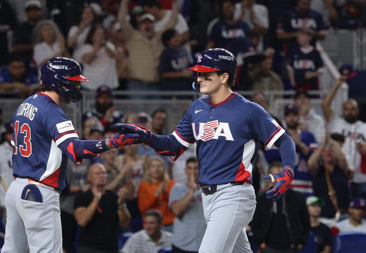 United States second baseman Brice Turang (13), greets United States right fielder Roman Anthony (3), right, after his home run in the 4th inning at semi-finals of the World Baseball Classic United States vs. Dominican Republic at the loanDepot Park on Sunday, March 15, 2026, in Miami, Florida.