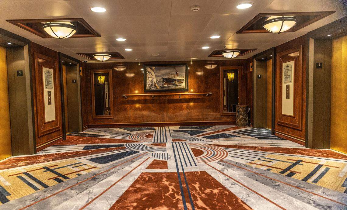 View of a lobby on deck four inside the Cunard cruise ship Queen Elizabeth as it sits docked at PortMiami on Thursday, Oct. 16, 2025, in Miami. The vessel arrived around 6 a.m. and will be based in Miami for six months, offering voyages to the Caribbean. After tours and festivities, the ship is scheduled to depart later Thursday on its inaugural 12-night Caribbean cruise.