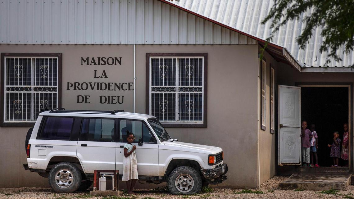 Children stand in the courtyard of the Maison La Providence de Dieu orphanage in Ganthier, Croix-des-Bouquets, Haiti, Sunday, Oct. 17, 2021, where a gang abducted 17 missionaries from a U.S.-based organization. The 400 Mawozo gang, notorious for brazen kidnappings and killings took the group of 16 U.S. citizens and one Canadian, after a trip to visit the orphanage.
