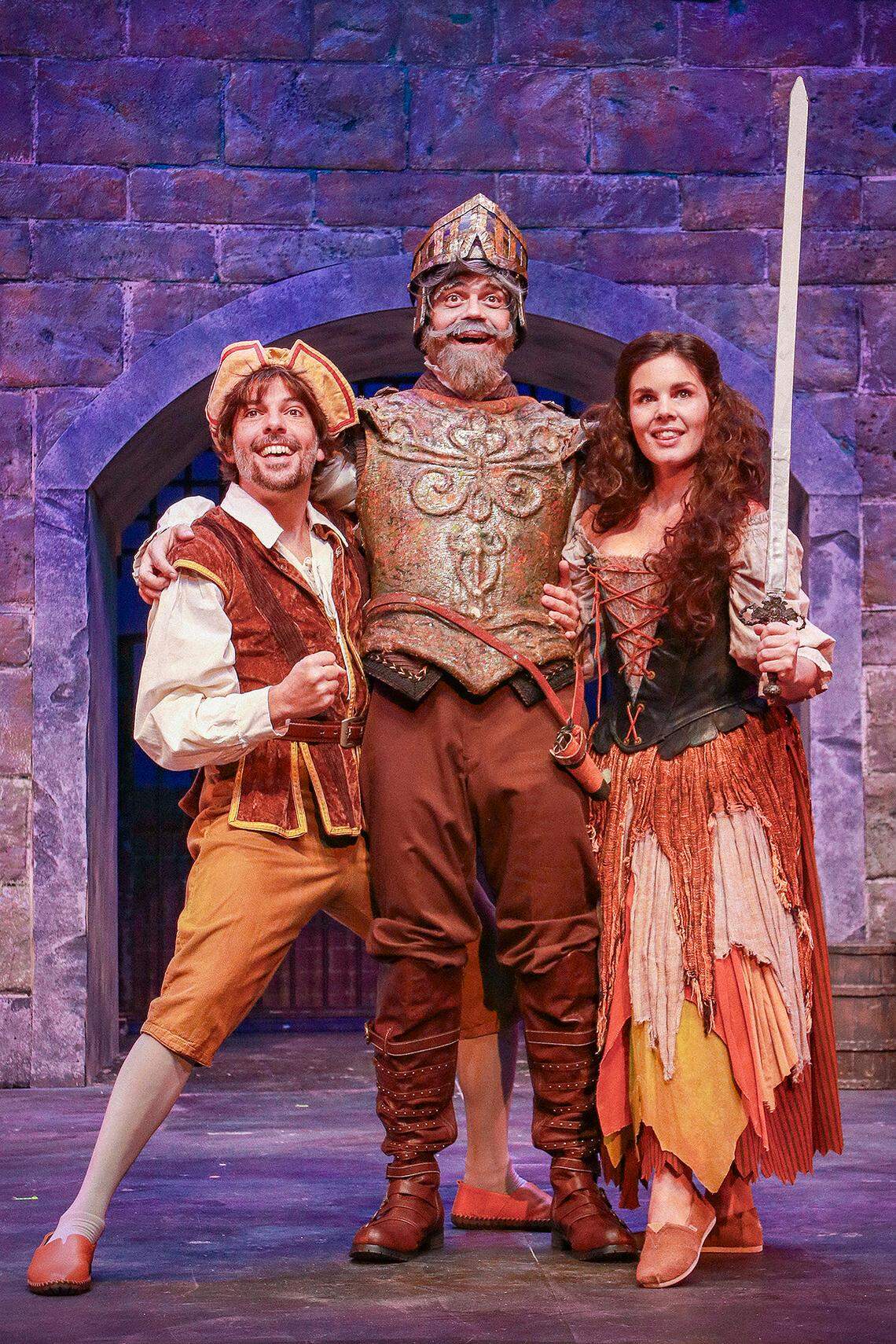 Jose Luaces as Sancho Panza, E.L. Losada as Don Quixote/Cervantes and Gaby Tortoledo as Aldonza in Actors’ Playhouse’s 30th anniversary production of “Man of La Mancha.”