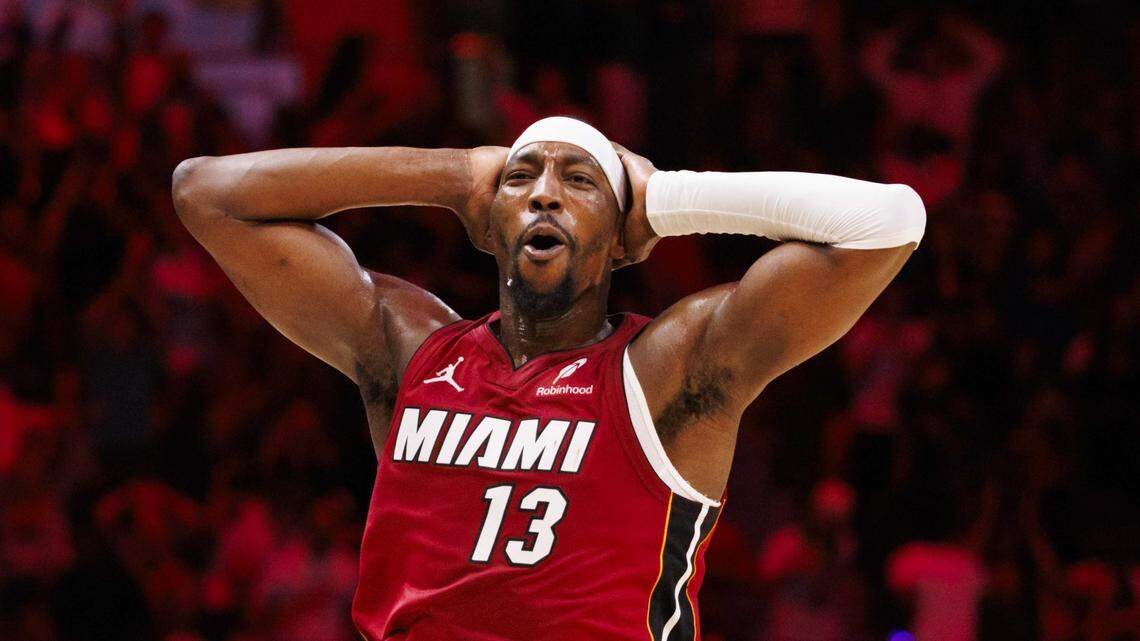 Miami Heat center Bam Adebayo (13) reacts after making a basket during the second half of a game against the Phoenix Suns on Jan. 13, 2026, at Kaseya Center in Miami.