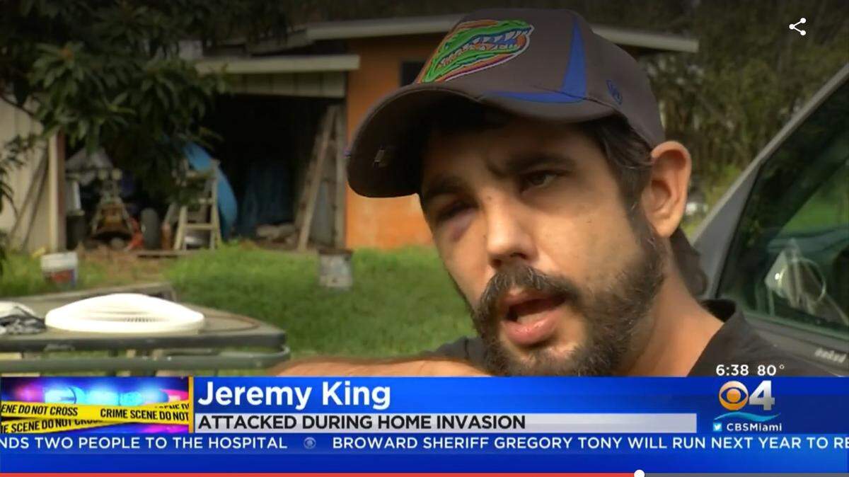 Jeremy King speaks to reporters outside his Tampa-area home after two men broke in, pulled guns on his wife and daughter, and beat him on Oct. 30, 2019.