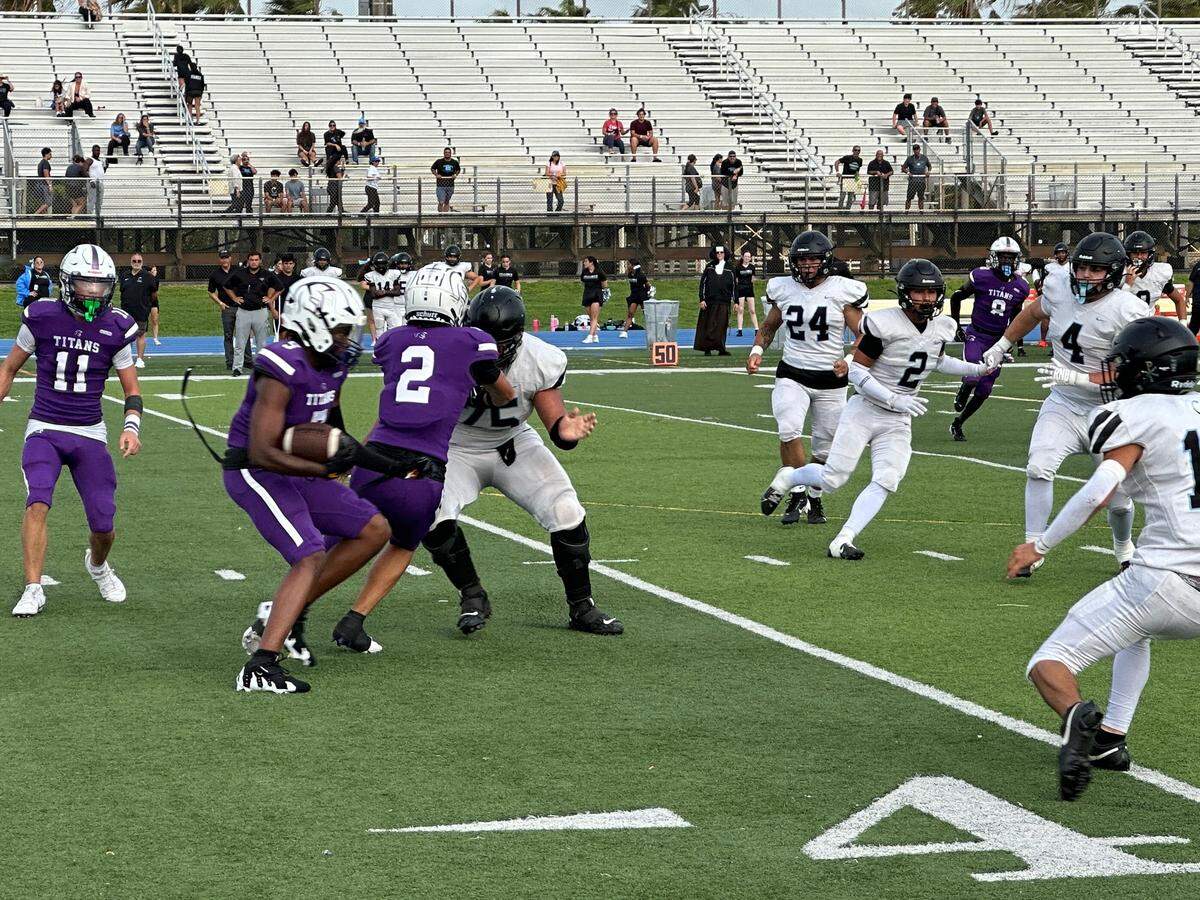 True North’s Kamari Bailey returns a punt against Archbishop Carroll on Thursday afternoon at Tropical Park in Miami, Fla.