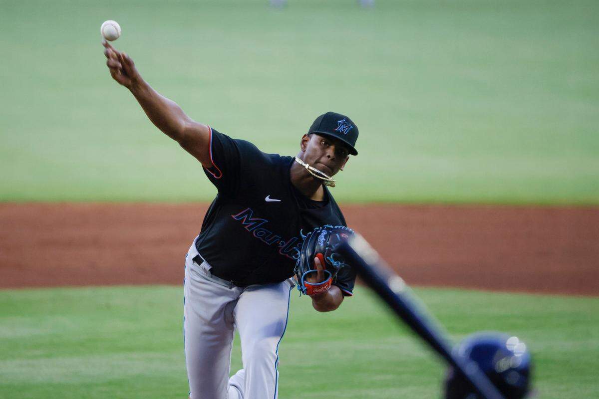 Miami Marlins starting pitcher Edward Cabrera throws during the first inning of the team’s baseball game against the Miami Marlins on Saturday, Sept. 3, 2022, in Atlanta. (AP Photo/Bob Andres)