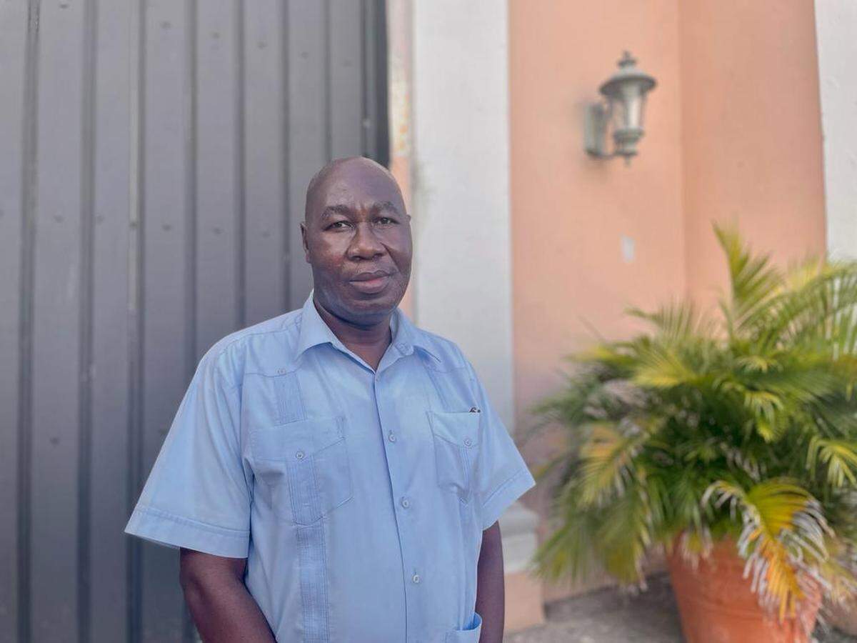 Father Pierre-Louis, who is Haitian, has been the parish leader at the San Mateo de Cangrejos Church for over 10 years.