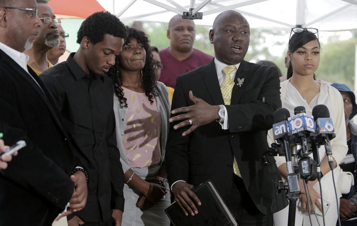 Nationally renowned civil rights and personal injury attorney Ben Crump, center, stands with family members of Latasha Walton during a press conference Tuesday, March 19, 2019, to address the shooting death of Walton on March 12 by a Florida Highway Patrol trooper. He was joined by the NAACP and Dyma Loving, a 26-year-old Black woman who was unjustly targeted and handled by Miami-Dade police on March 5.