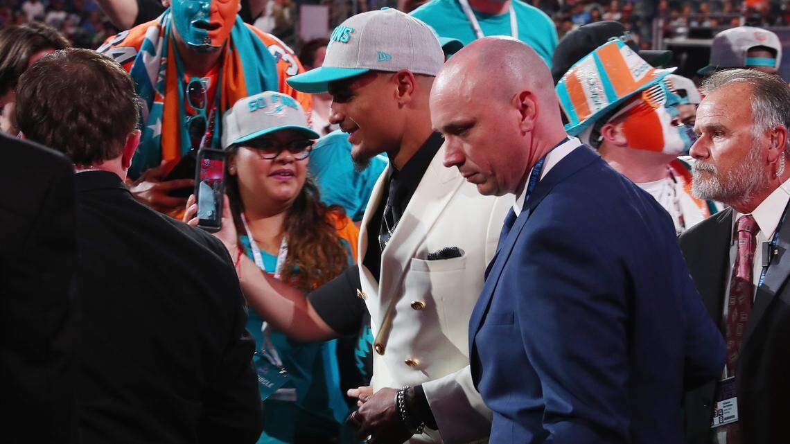 Minkah Fitzpatrick of Alabama walks among fans after being picked #11 overall by the Miami Dolphins during the first round of the 2018 NFL Draft at AT&T Stadium on April 26, 2018 in Arlington, Texas.