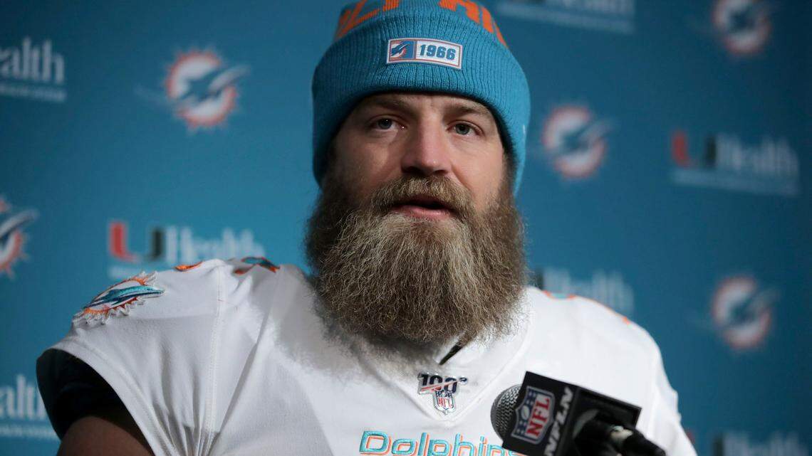 Miami Dolphins quarterback Ryan Fitzpatrick speaks to the media following an NFL football game against the New England Patriots, Sunday, Dec. 29, 2019, in Foxborough, Mass. (AP Photo/Charles Krupa)