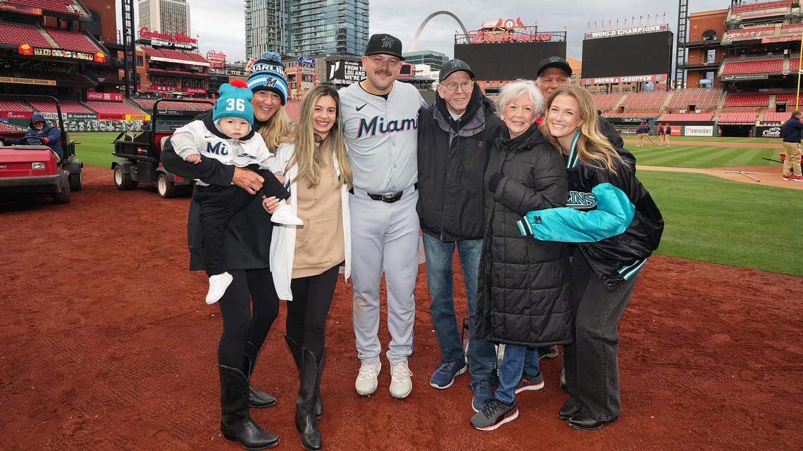 Miami Marlins infielder Jake Burger poses with family after the Marlins’ game against the St. Louis Cardinals on Thursday, April 4, 2024, at Busch Stadium in St. Louis, Missouri.