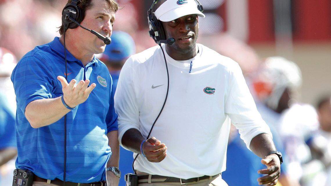 Sep 20, 2014; Tuscaloosa, AL, USA; Florida Gators head coach Will Muschamp (left) and Travaris Robinson during the game against the Alabama Crimson Tide at Bryant-Denny Stadium. Mandatory Credit: Marvin Gentry-USA TODAY Sports