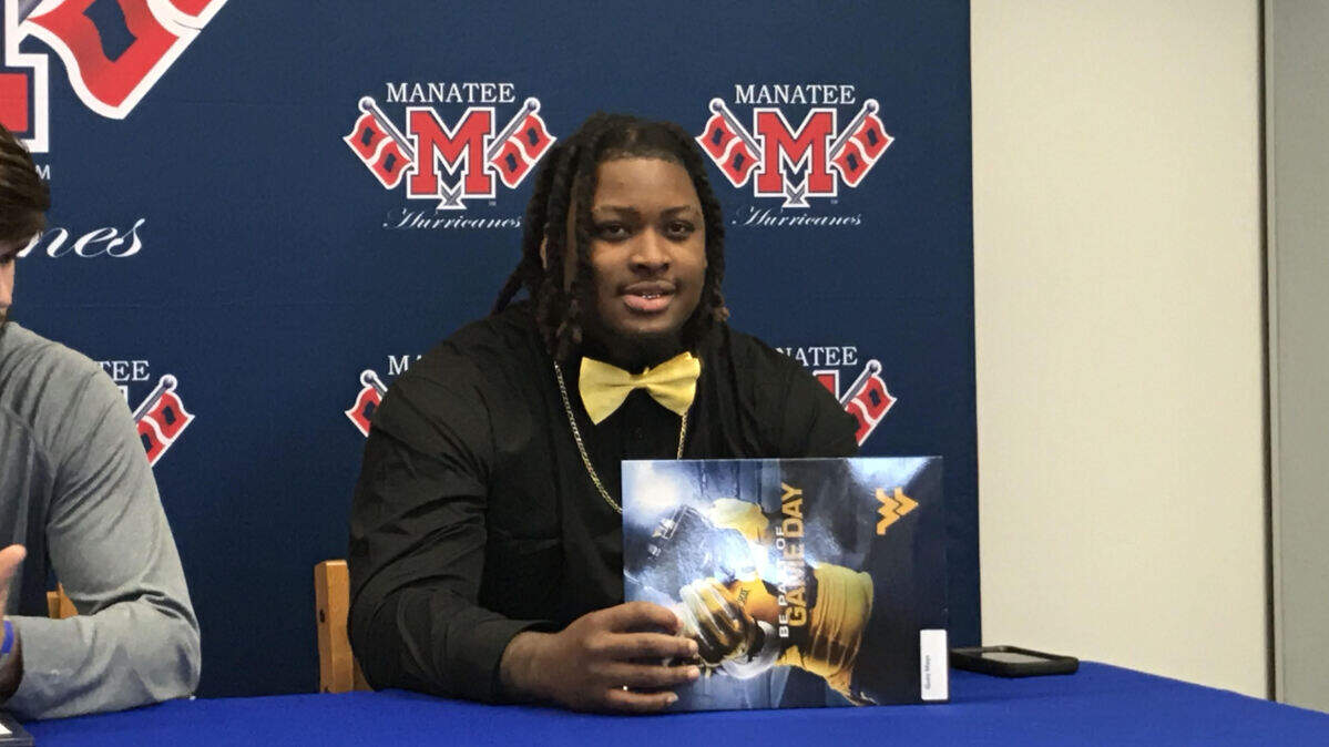 Quay Mays signed with West Virginia University on Wednesday, Dec. 18, 2019 at Manatee High School during the early signing period.