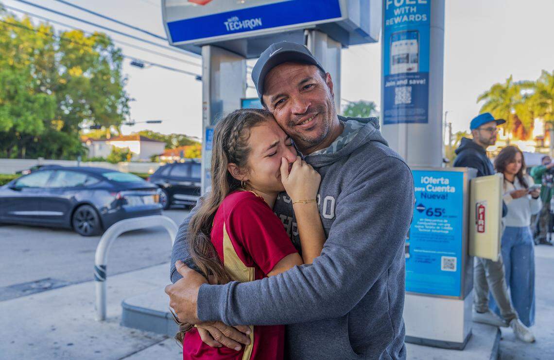 Jose Matos and his daughter Maria Matos reacted as they joined a group of Venezuelan exiles living in South Florida celebrating outside of El Arepazo in Doral, Florida, after the United States attacked Venezuela and captured Venezuelan leader Nicolás Maduro, on Jan. 3, 2026.