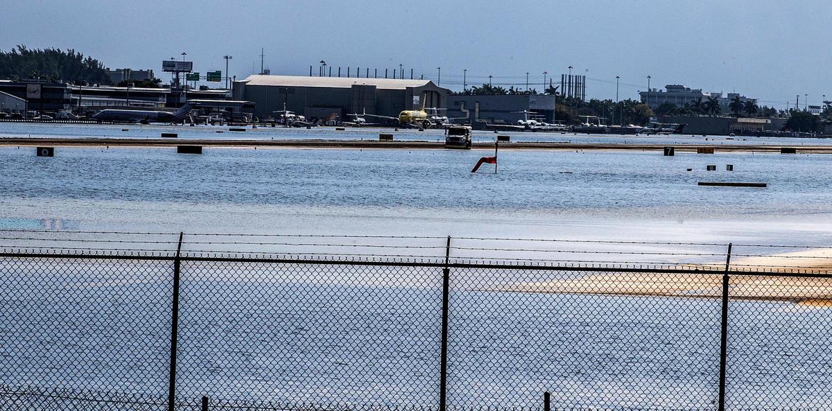 The flooded runway at Fort Lauderdale-Hollywood International Airport that remains closed due to the heavy rain that affected Broward County for the last two days, on Thursday, April 13, 2023.