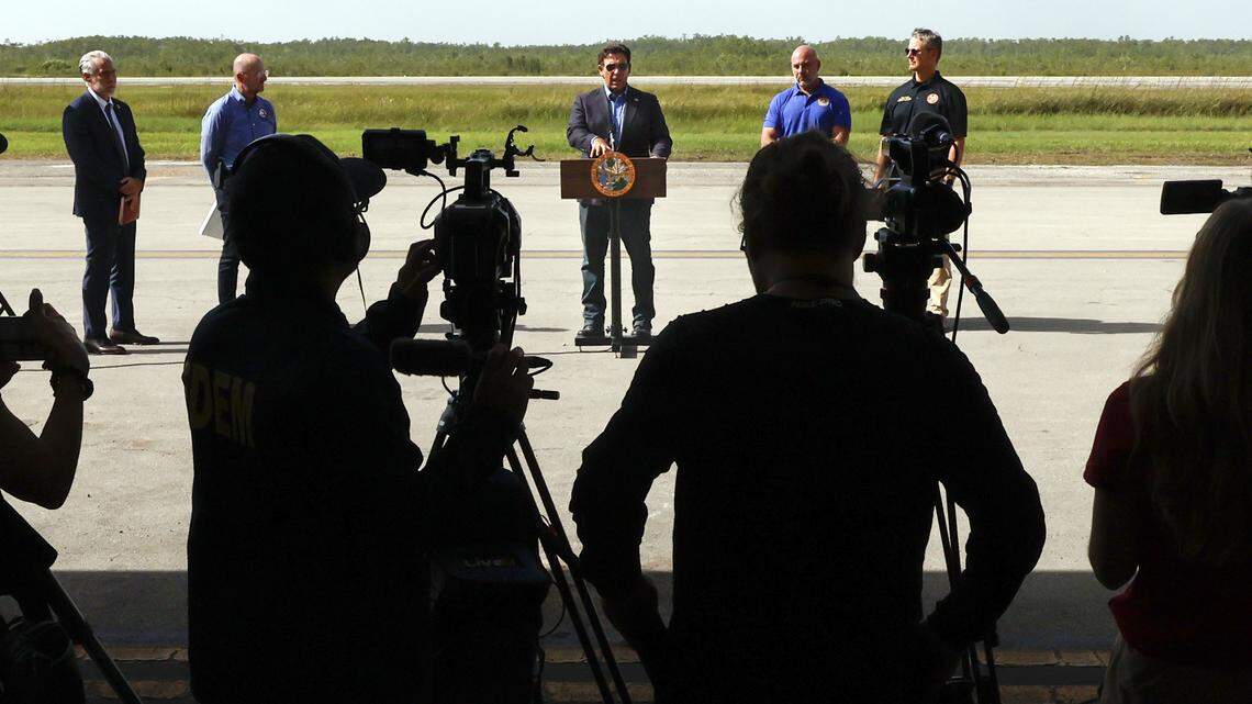 Governor Ron DeSantis speaks to reporters during a press conference as he stands on the airplane runway of Alligator Alcatraz in Ochopee , Florida on Friday, July 25, 2025. 