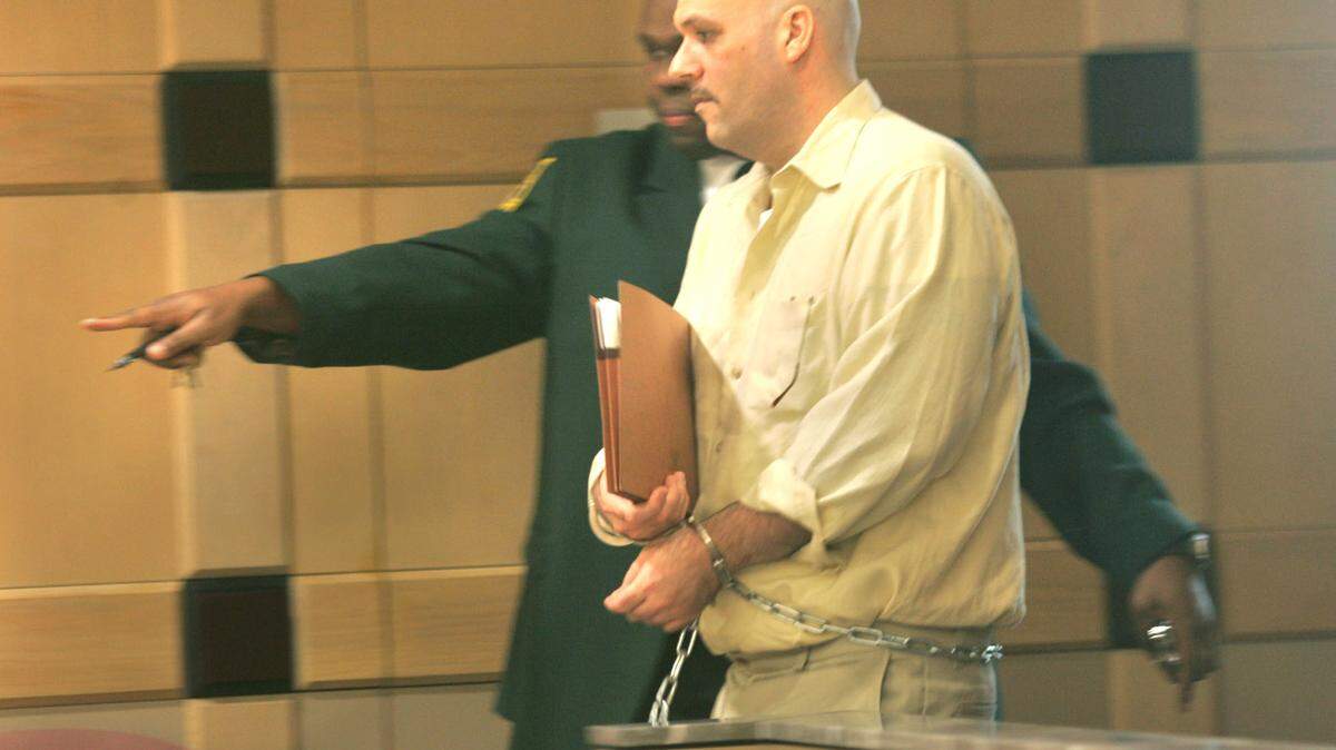 Howard Steven Ault is taken by bailiff to be fingerprinted on October 24, 2007, after Broward County Circuit Judge Marc Gold read his sentence, at Broward County Courthouse, for murder and sexually abusing two young girls. He was sentenced to death.