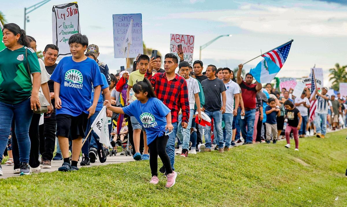 Protestors march along US1 for a “Freedom For All” rally in Homestead, Florida, as they protest against the bills passed by the Florida Legislature and signed into law by Gov. Ron DeSantis on Saturday, July 1, 2023.
