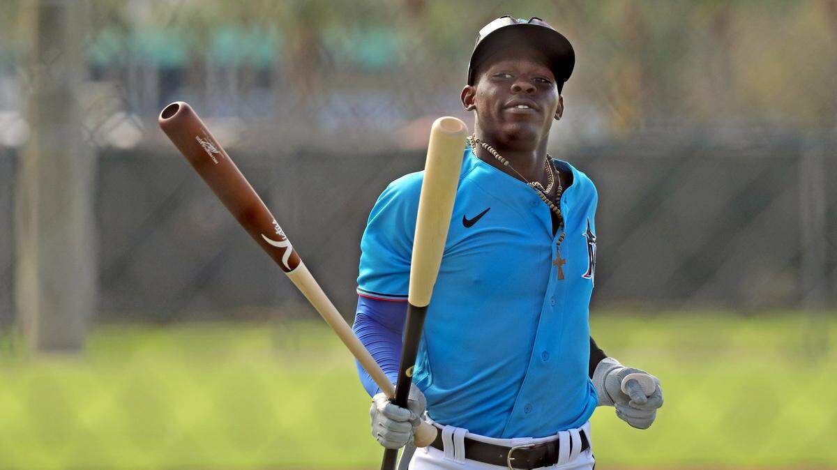 Miami Marlins infielder Jazz Chisholm (2) swings a couple of bats during Marlins spring training at the Roger Dean Chevrolet Stadium in Jupiter on Tuesday, February 23, 2021.