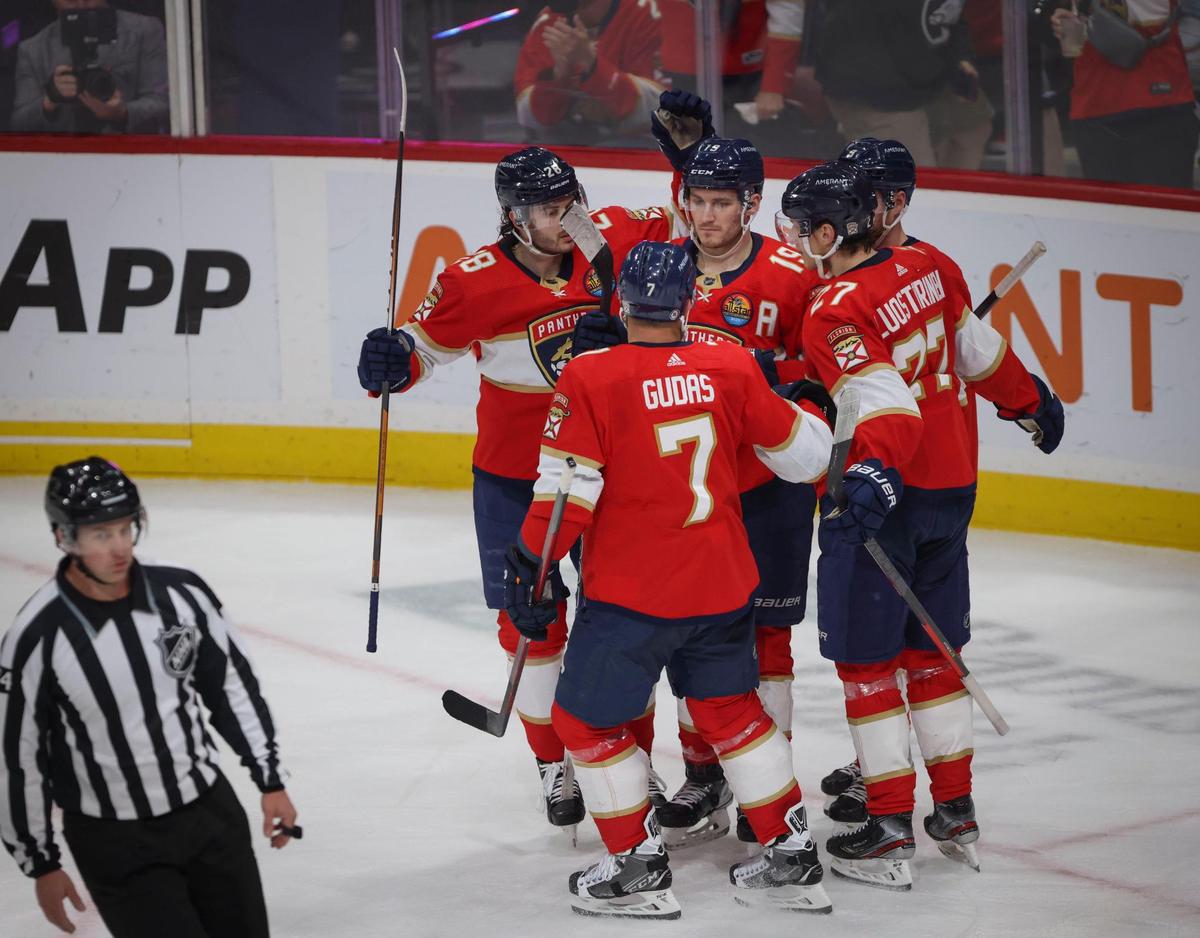 The Florida PAnther’s congratulate Florida Panther’s left wing Matthew Tkachuk (19) on a goal during the second period of a NHL game between the Florida Panthers and the Arizona Coyotes on Tuesday, Jan. 3, 2023, at FLA Live Arena in Sunrise, Fla. The Panther’s were up 5-3 at the end of the second period.