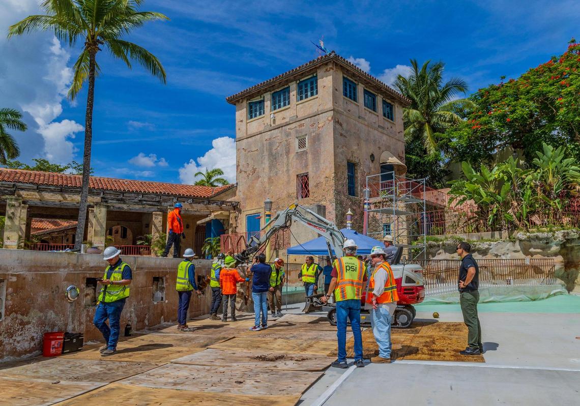 Workers are seen at the Venetian Pool in Coral Gables, which has been closed to the public since October, on Tuesday, July 22, 2025.