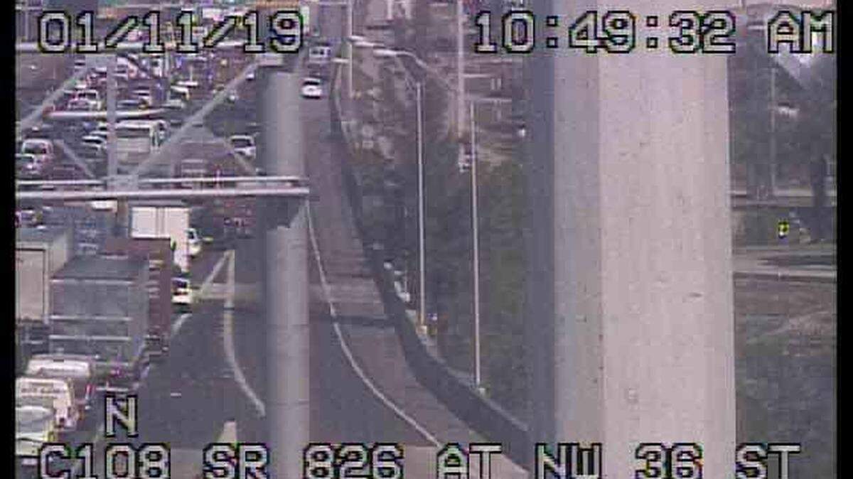 Traffic is backed up as all lanes but one were closed on northbound SR 826 and 58th Street Friday morning, Jan. 11, 2019, after a man ran out onto the road. Three vehicles may have been involved and traffic is seen backed up at Northwest 36th Street.