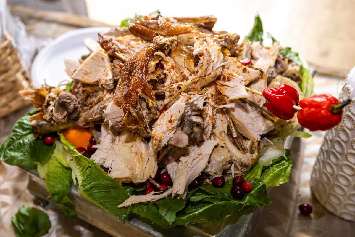 A traditional entree of carved turkey is served during the 18th Annual Haitian Thanksgiving Brunch.