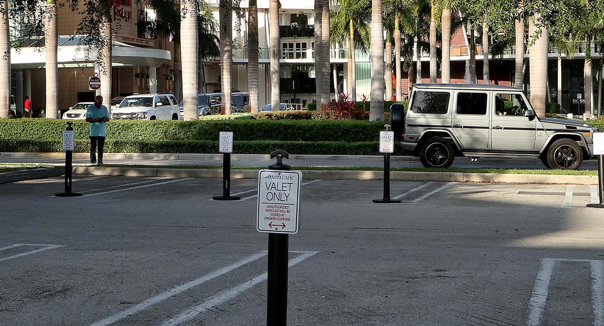 View of empty parking spaces for the valet parking use only at Dadeland Mall.