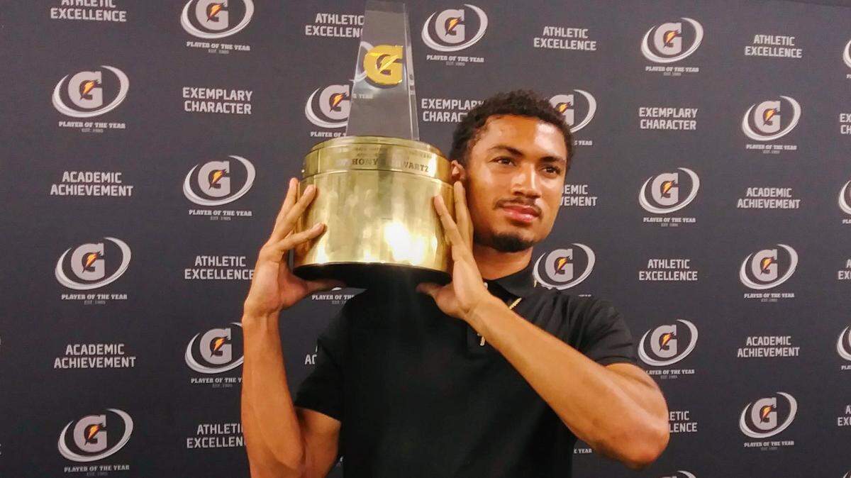Plantation American Heritage standout Anthony Schwartz poses with the Gatorade National Boys Track and Field Athlete of the Year award Thursday, June 28, 2018.