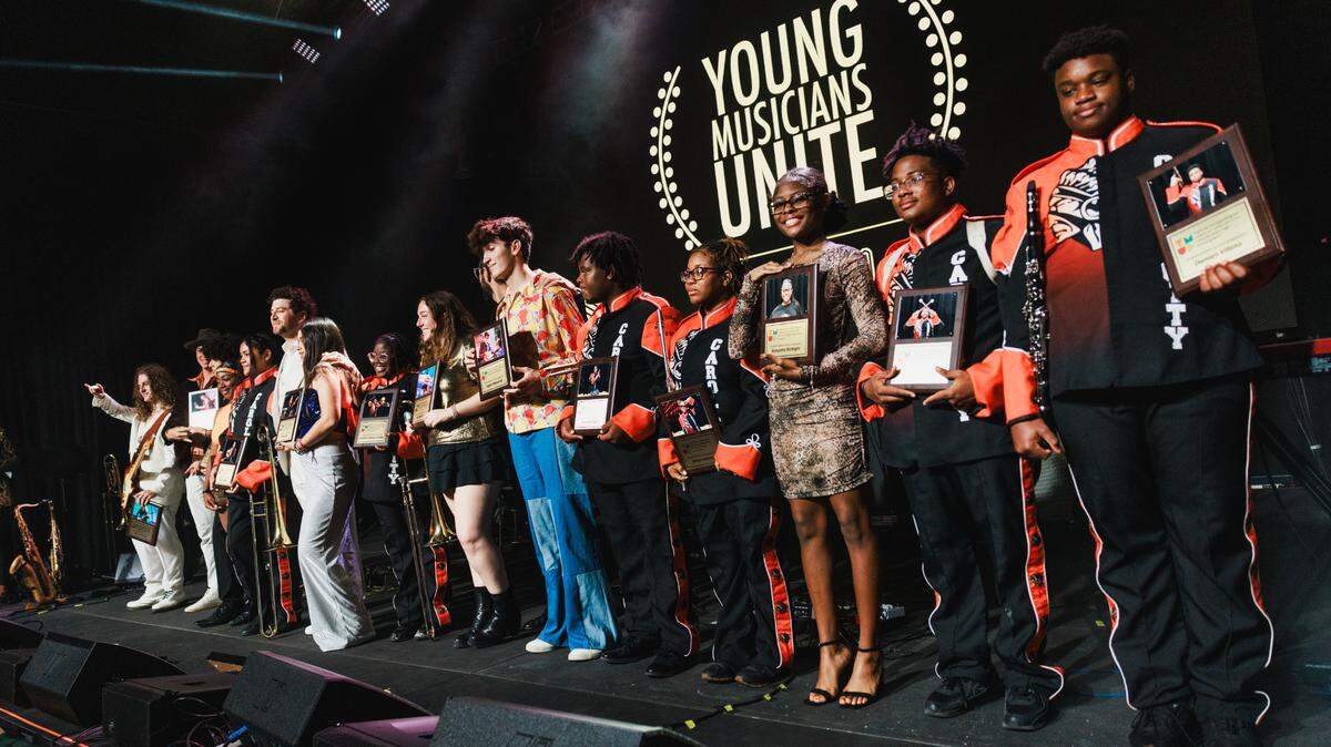Graduating seniors from Young Musicians Unite receive their awards at the YMU 11th Annual Gala.