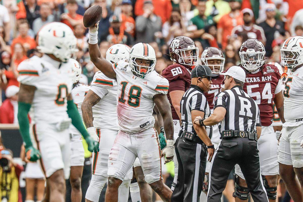 Miami Hurricanes defensive lineman Armondo Blount (18) reacts after recovering a fumble by Texas A&M Aggies quarterback Marcel Reed (10) in the first half of the first round of the 2025 College Football Playoff at Kyle Field at College Station, Texas, on Saturday, December 20, 2025.