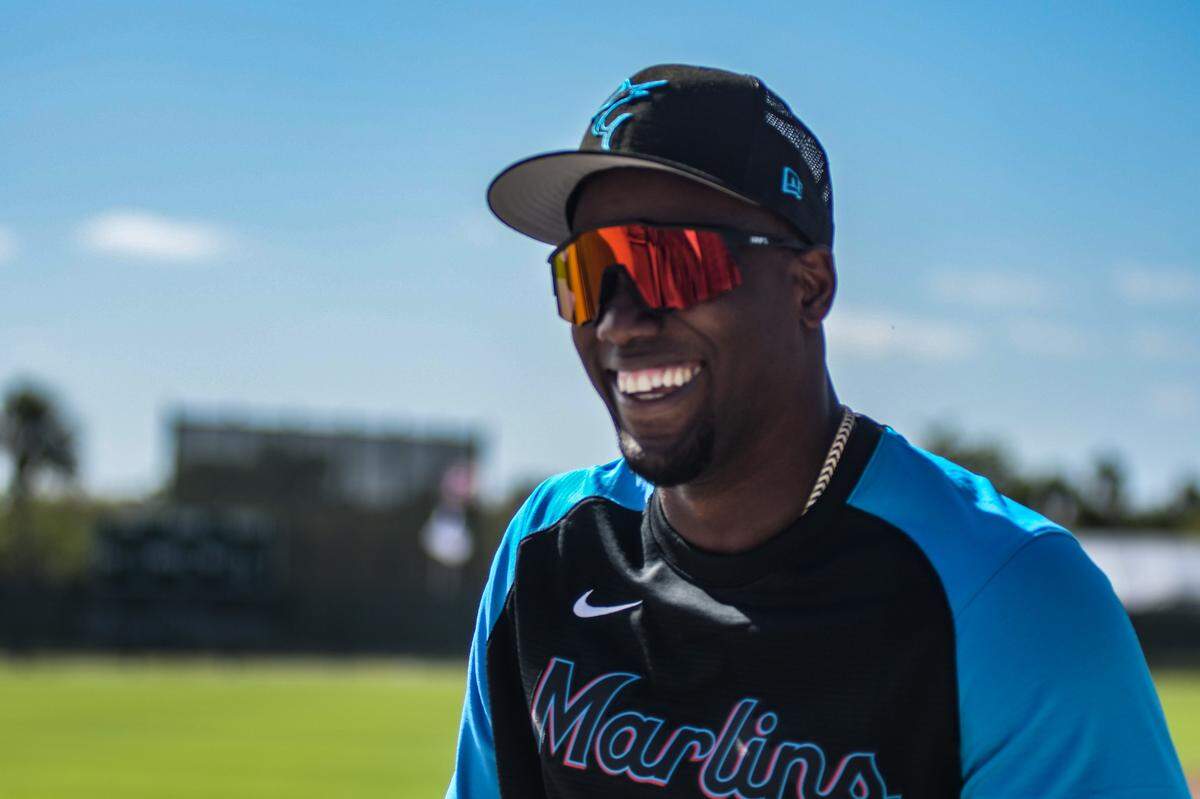 Miami Marlins outfielder/designated hitter Jorge Soler smiles as he walks off a back field of the Roger Dean Chevrolet Stadium complex in Jupiter, Florida, on Tuesday, March 22, 2022.