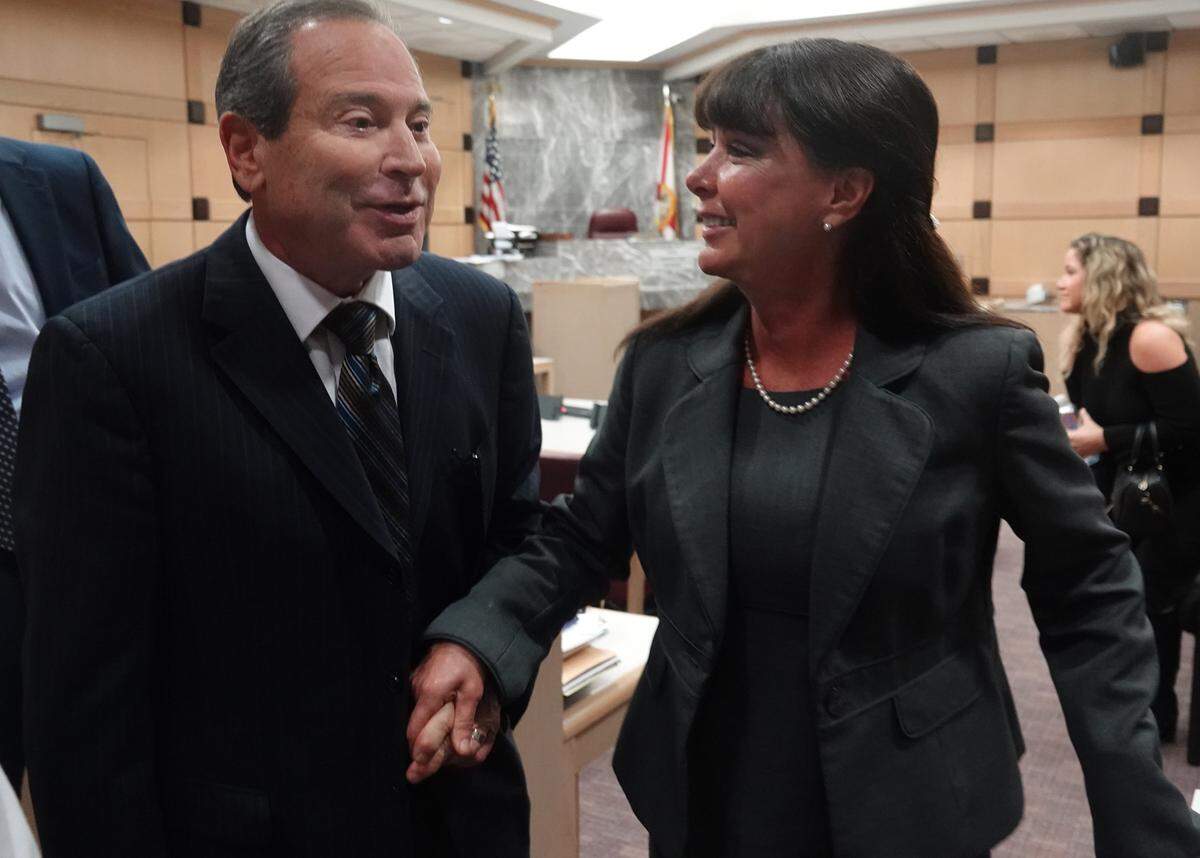 Hallandale Beach Mayor Joy Cooper with her husband, Dr. Harry Cooper, during her trial. She was acquitted of all charges and reinstated as mayor by Gov. Ron DeSantis.