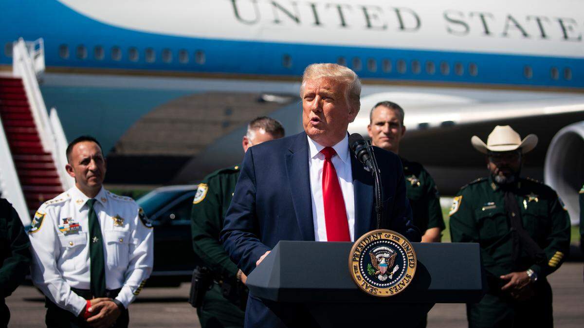President Donald Trump speaks at a campaign coalitions event with Florida Sheriffs, on the tarmac of Tampa International Airport, in Tampa, Fla., on Friday, July 31, 2020.