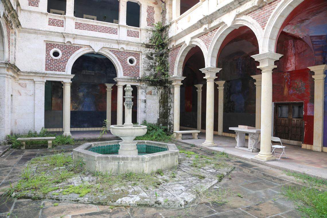 The interior courtyard and arcade with contemporary frescoes by David Novros in the David W. Dyer federal building in 2015.