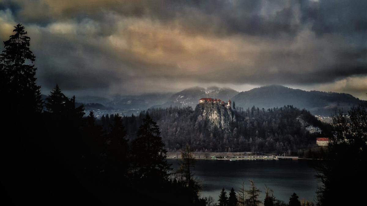A view of Bled castle taken from the Straza hills above lake of Bled, in the foothills of the Julian Alps on February 11, 2021.