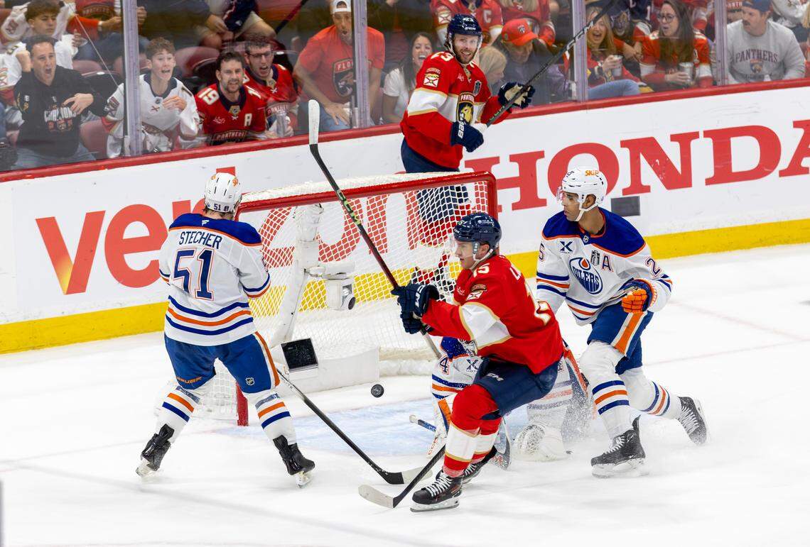 Florida Panthers center Anton Lundell (15) fires a shot past Edmonton Oilers goaltender Stuart Skinner (74) to score during the first period of Game 4 in the NHL Stanley Cup Final at Amerant Bank Arena on Thursday, June 12, 2025, in Sunrise, Fla.