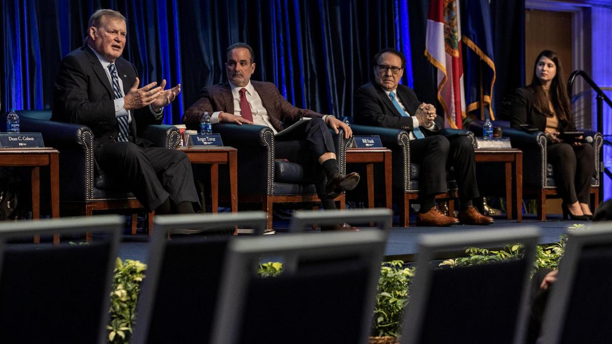 From left, panelists Dean Colson, Roger Tovar, Bill Funk and Sofia Trelles during a community listening session on the FIU presidential search, held at FIU’s Graham University Center in west Miami-Dade on April 13, 2022.