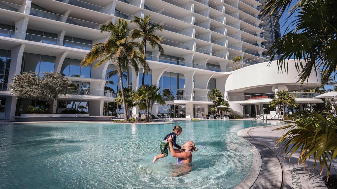 Sierra Drew plays with her son Shai Librati, 2, at Jade Signature Condominium at 16901 Collins Ave., Sunny Isles Beach on Friday, Dec. 3, 2021. Third-quarter condo sales figures for the eight Miami beachfront communities showed a slew of buyers closed purchases compared with a year ago.