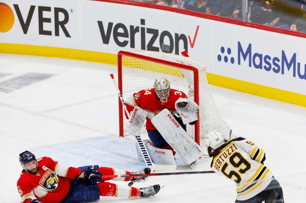Florida Panthers goaltender Alex Lyon (34) defend the goal as defenseman Aaron Ekblad (5) stop a shot by Boston Bruins left wing Tyler Bertuzzi (59) during the first period of Game 3 of a first round NHL Stanley Cup series at FLA Live Arena on Friday, April 21, 2023 in Sunrise, Fl.