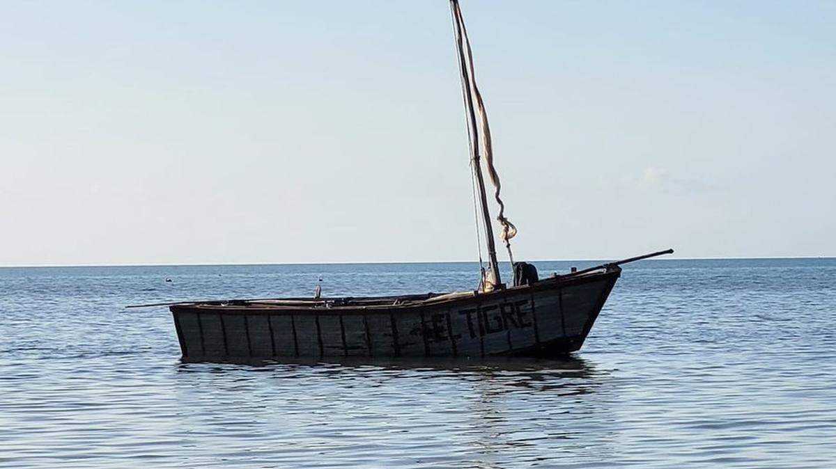 A migrant boar floats in the shallow water near Long Key in the Florida Key Thursday morning, Feb. 29, 2024. The U.S. Border Patrol said 20 people were on the vessel.