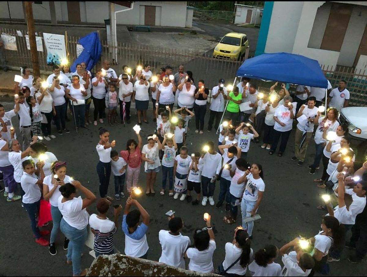 Families hold a candlelight vigil in April to protest the closing of Marcos Sánchez K-8 Center.