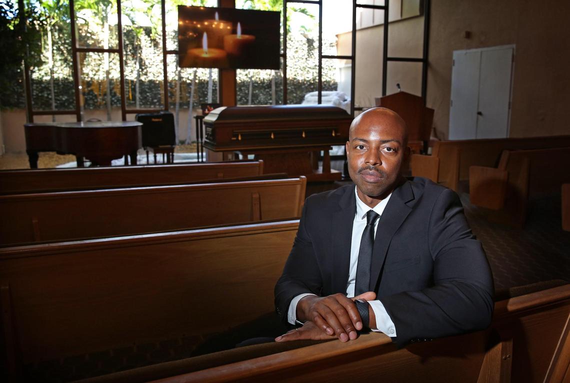 Evans St. Fort, CEO of the family-owned and operated St. Fort’s Funeral Home & Cremation in North Miami Beach, stands in the chapel Monday morning, August 10, 2020. The funeral home has seen a 30 percent increase in its business due to COVID-19 related deaths, which are hitting South Florida’s Haitian-American community especially hard.