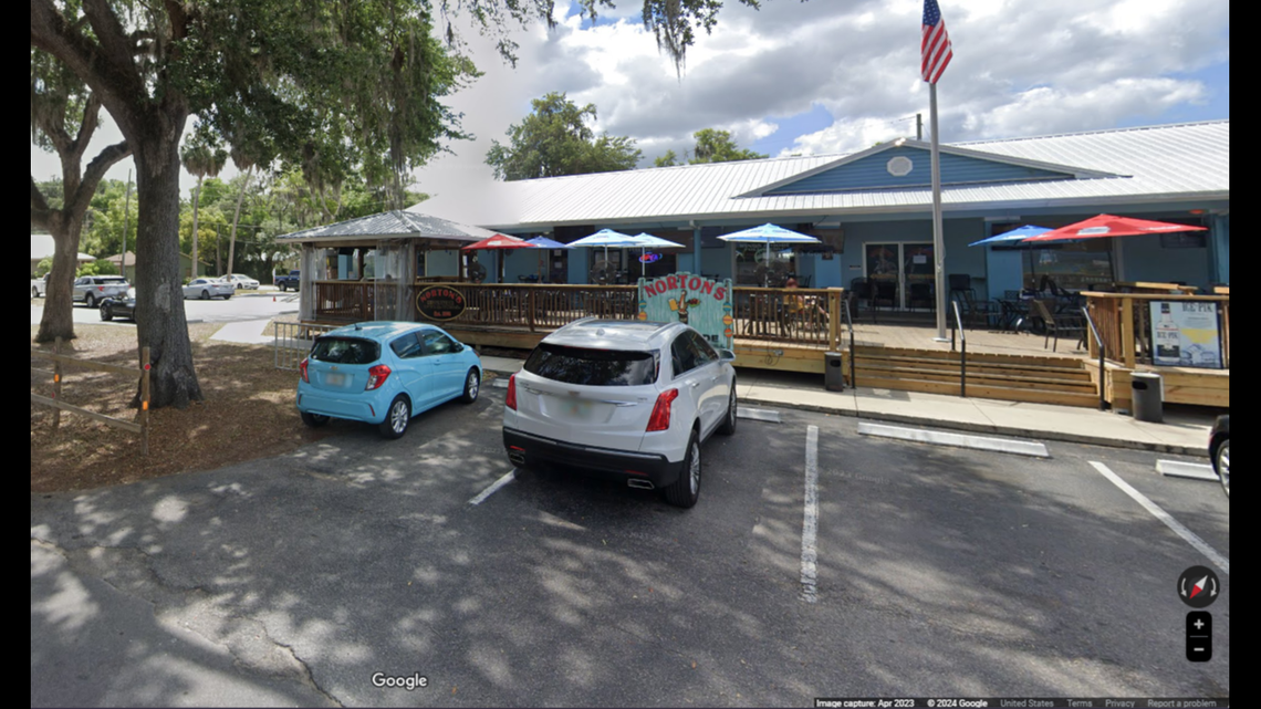 A Norton’s Riverside Bar and Grill employee was shot and killed in the parking lot after he tried to break up a fight between patrons, a Florida sheriff’s office said.