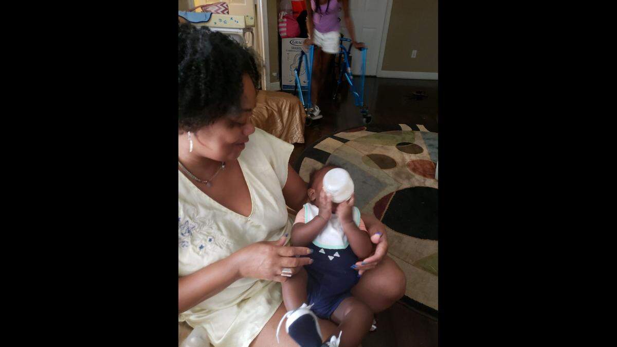 Elijah Bastien with his grandmother, Mary Anne Muller.