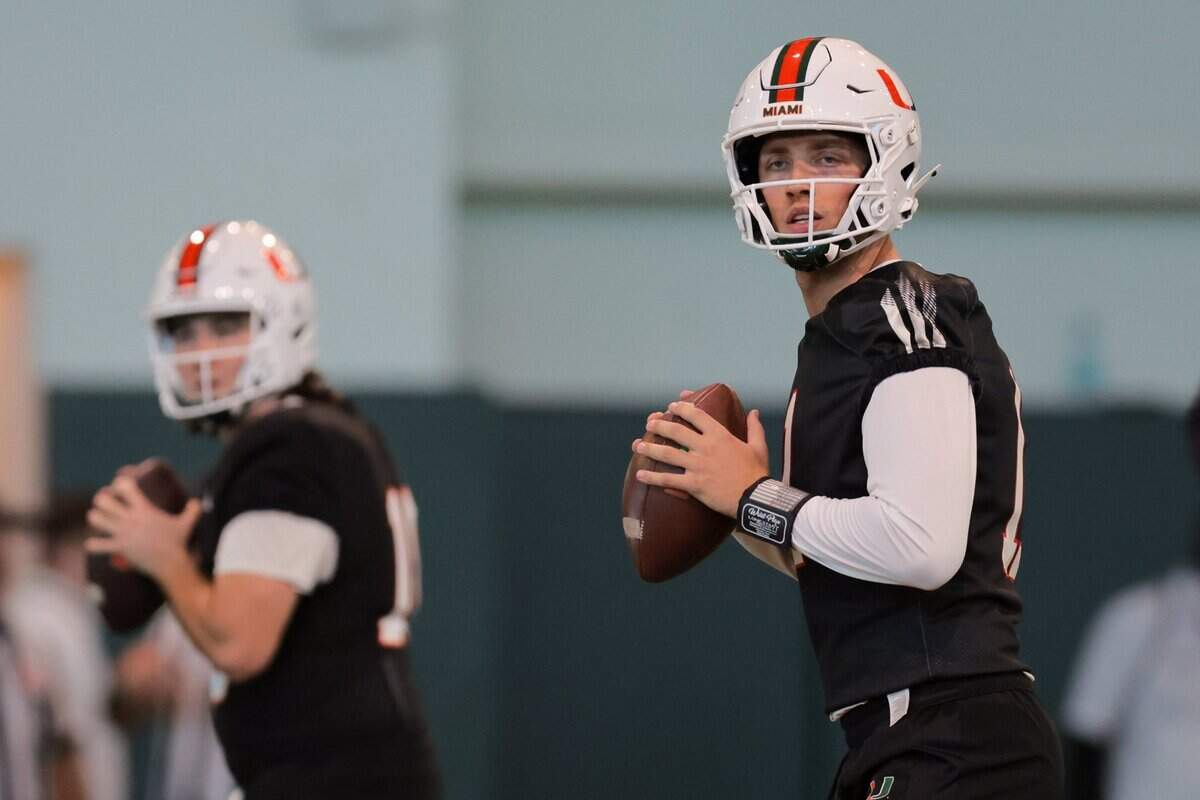 Miami Hurricanes quarterback Carson Beck (11) works out during spring practice at the Carol Soffer Indoor Practice Facility at the University of Miami in Coral Gables, Florida, Monday, March 3, 2025.