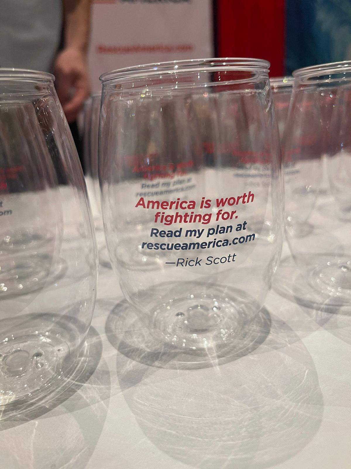 Cups being distributed by Sen. Rick Scott’s team at the Conservative Political Action Conference in Orlando on Feb. 26, 2022. Scott’s team made efforts to make sure his policy agenda for the GOP was visible at the CPAC store throughout the three-day conference.